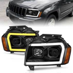 ANZO 05-07 GRAND CHEROKEE PROJECTOR HEADLIGHTS W/LIGHT BAR SWITCHBACK BLACK HOUSING